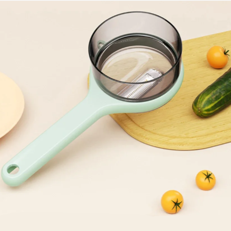 Versatile Vegetable and Fruit Peeler with Built-in Peel Storage